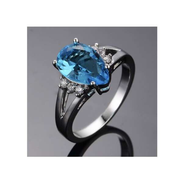 anillo topacio azul talla pera