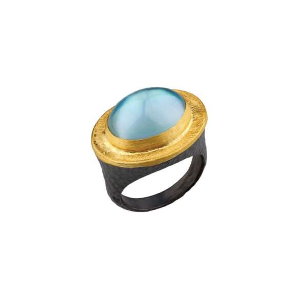 anillo topacio azul oval cabujón